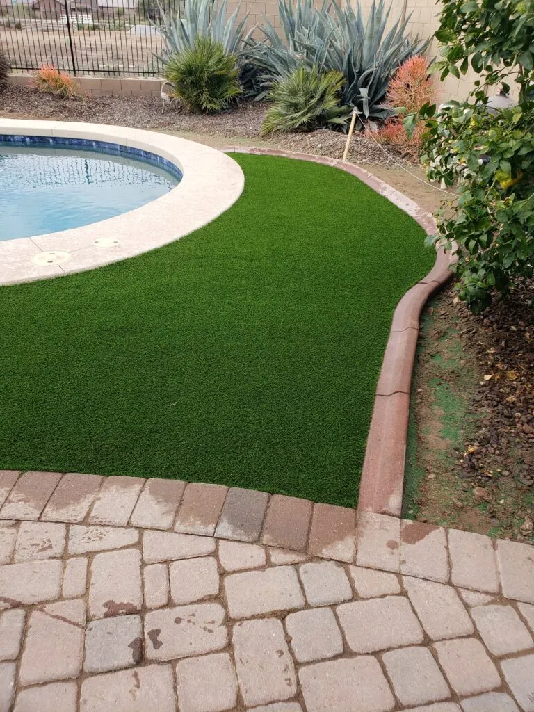 mowers edge curbing next to pool