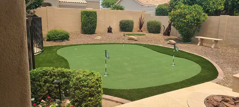 fringe area with putting green and 4 holes