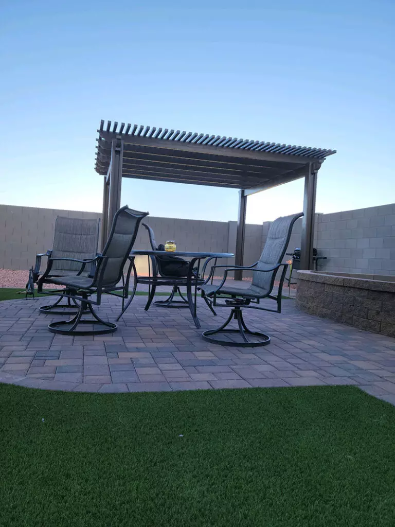 pergola sitting area in backyard