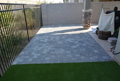 pavers in a HOA community and artificial grass