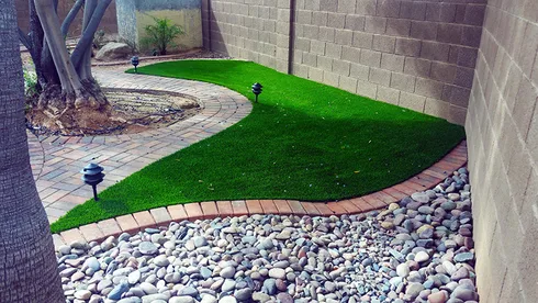 backyard after artificial grass install
