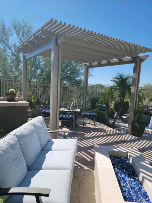 white aluminawood pergola with travertine fire pit