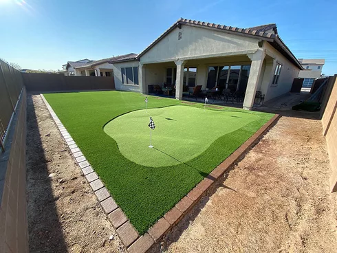 backyard putting green in HOA community